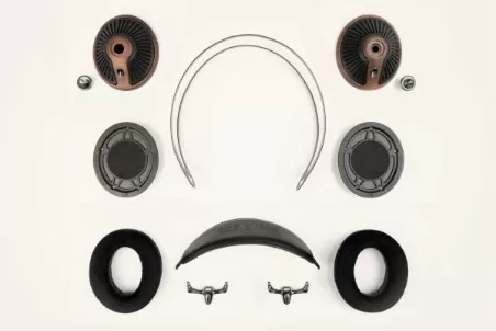 Obsah obrázku kruh, reproduktor, Sluchátka Obsah generovaný pomocí AI může být nesprávný.